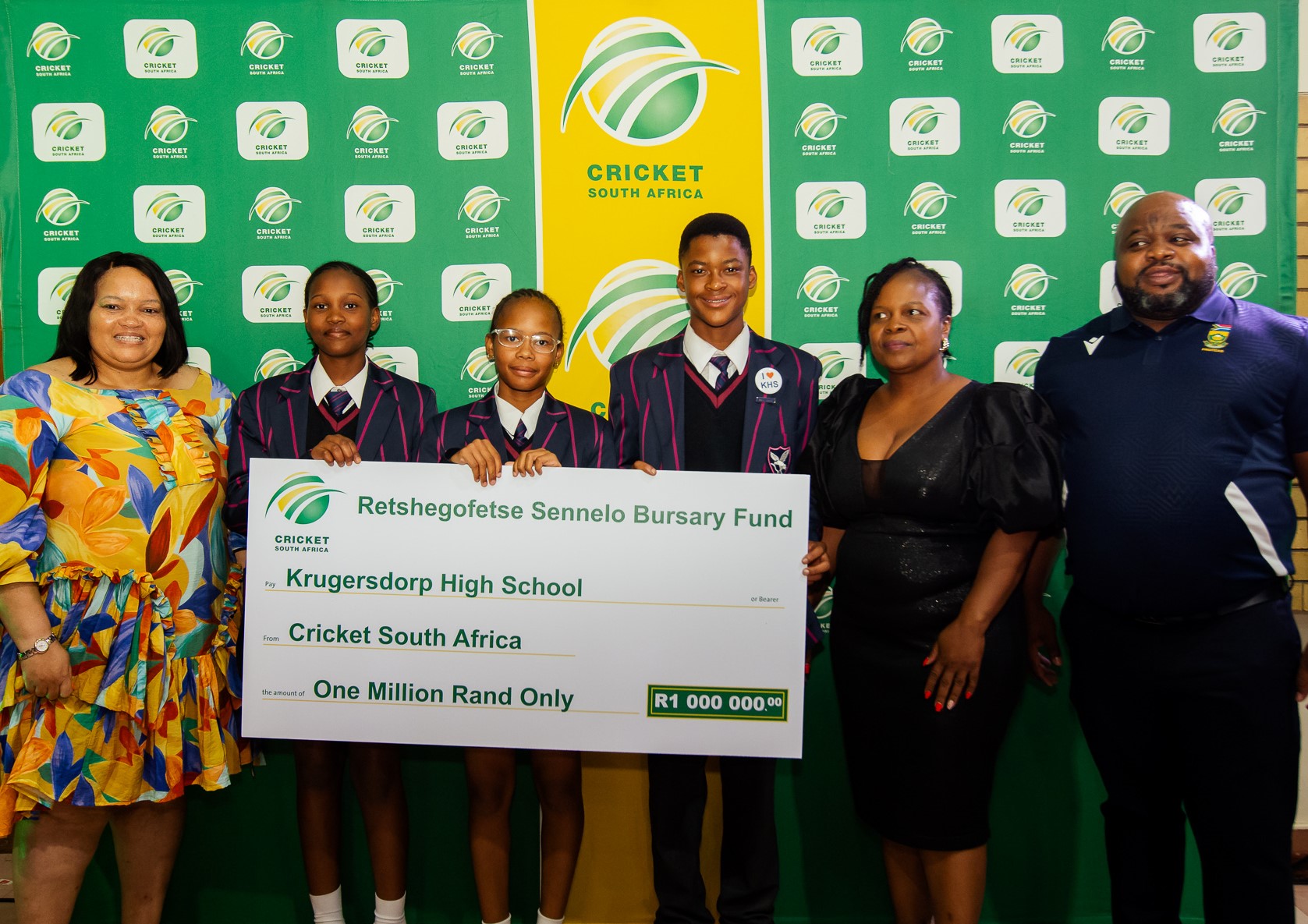 Deputy Minister of DSAC, Peace Mabe, with the recipients, Mrs Sennelo and CSA Executive for Domestic Cricket, Edward Khoza